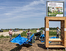 Onthulling Bouwbord