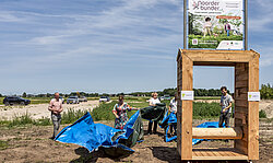 Onthulling Bouwbord